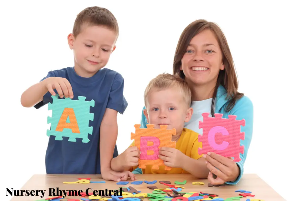 kids holding letter ABC puzzle mats
