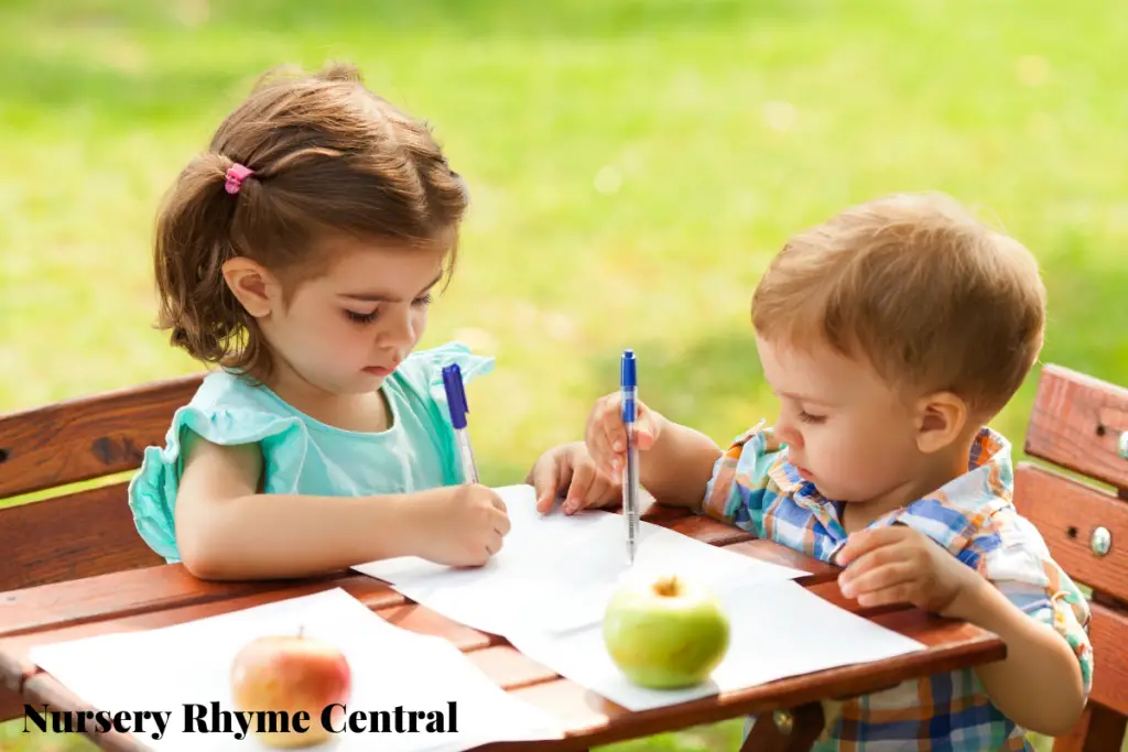 two kids writing on a paper